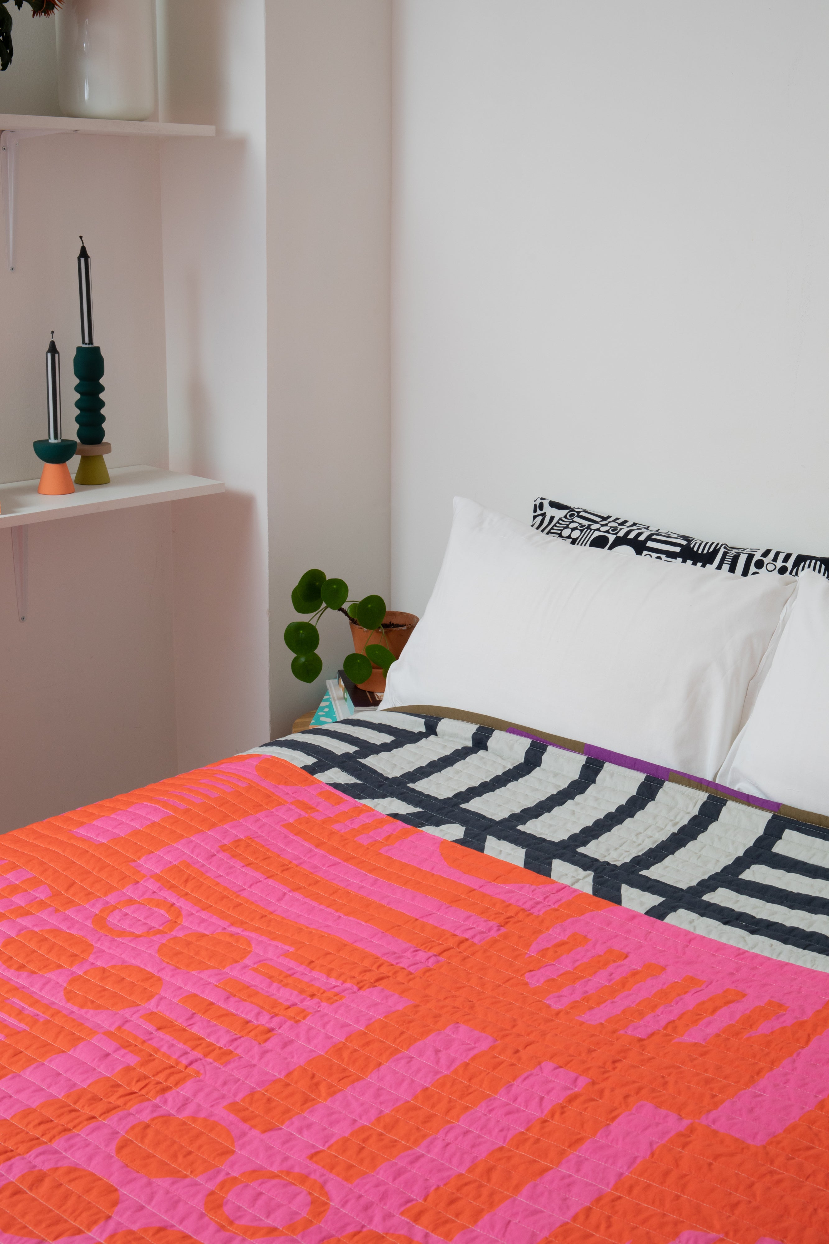 Reversible Quilted Throw in Hot Grape