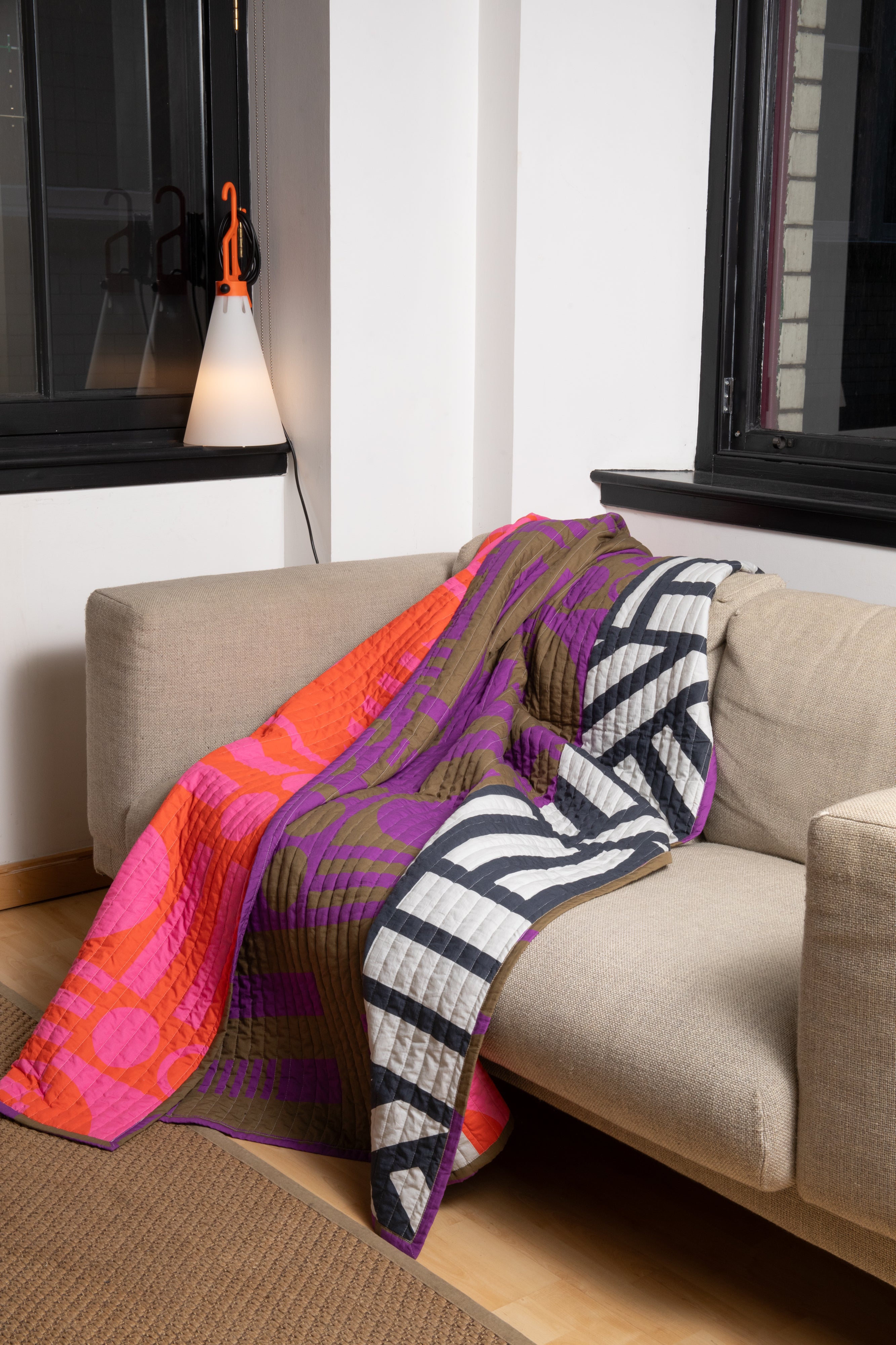 Reversible Quilted Throw in Hot Grape