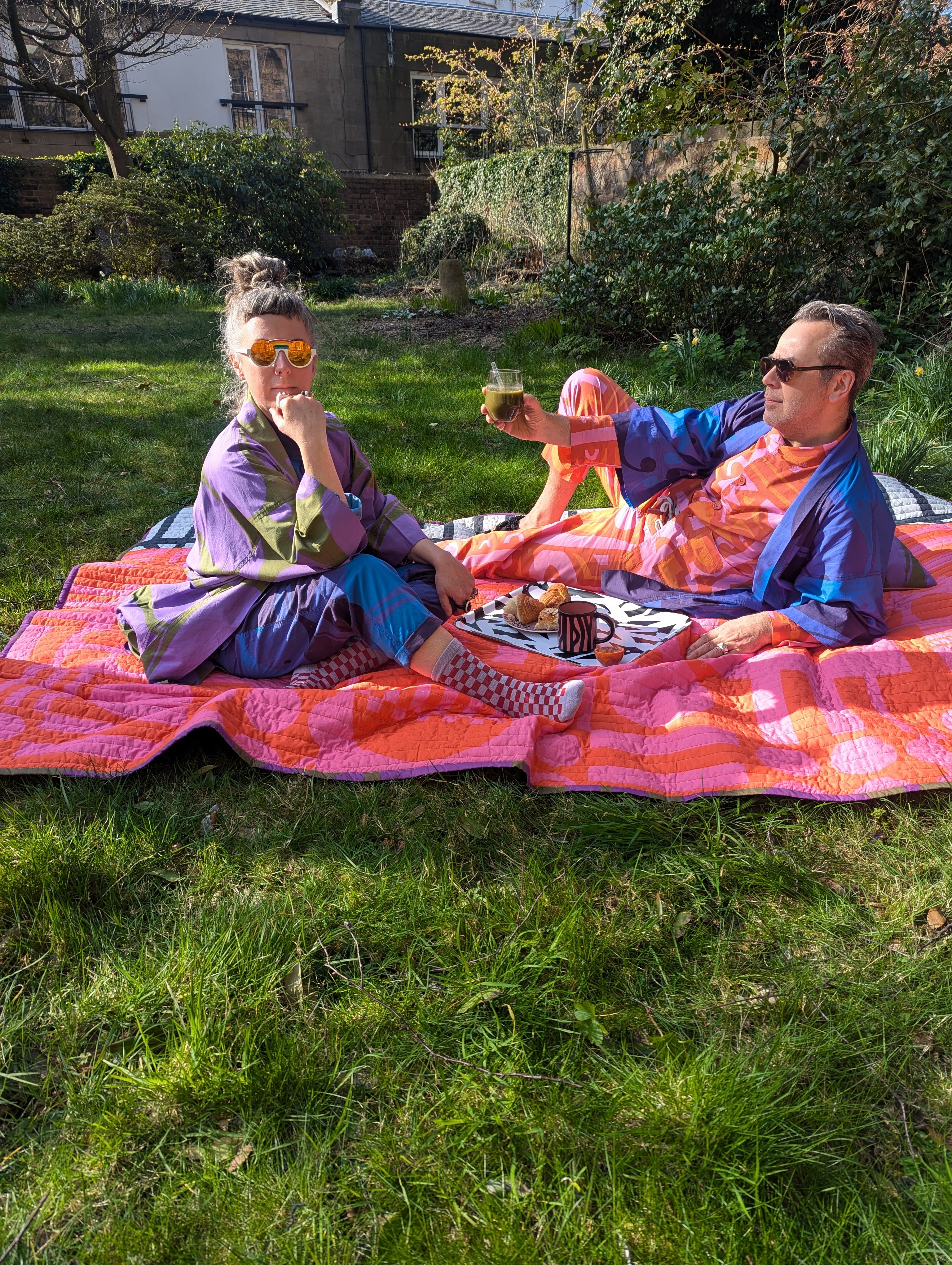 Reversible Quilted Throw in Hot Grape