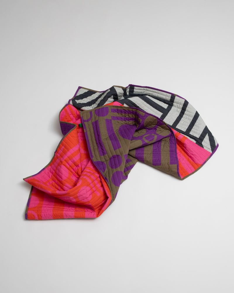 Reversible Quilted Throw in Hot Grape