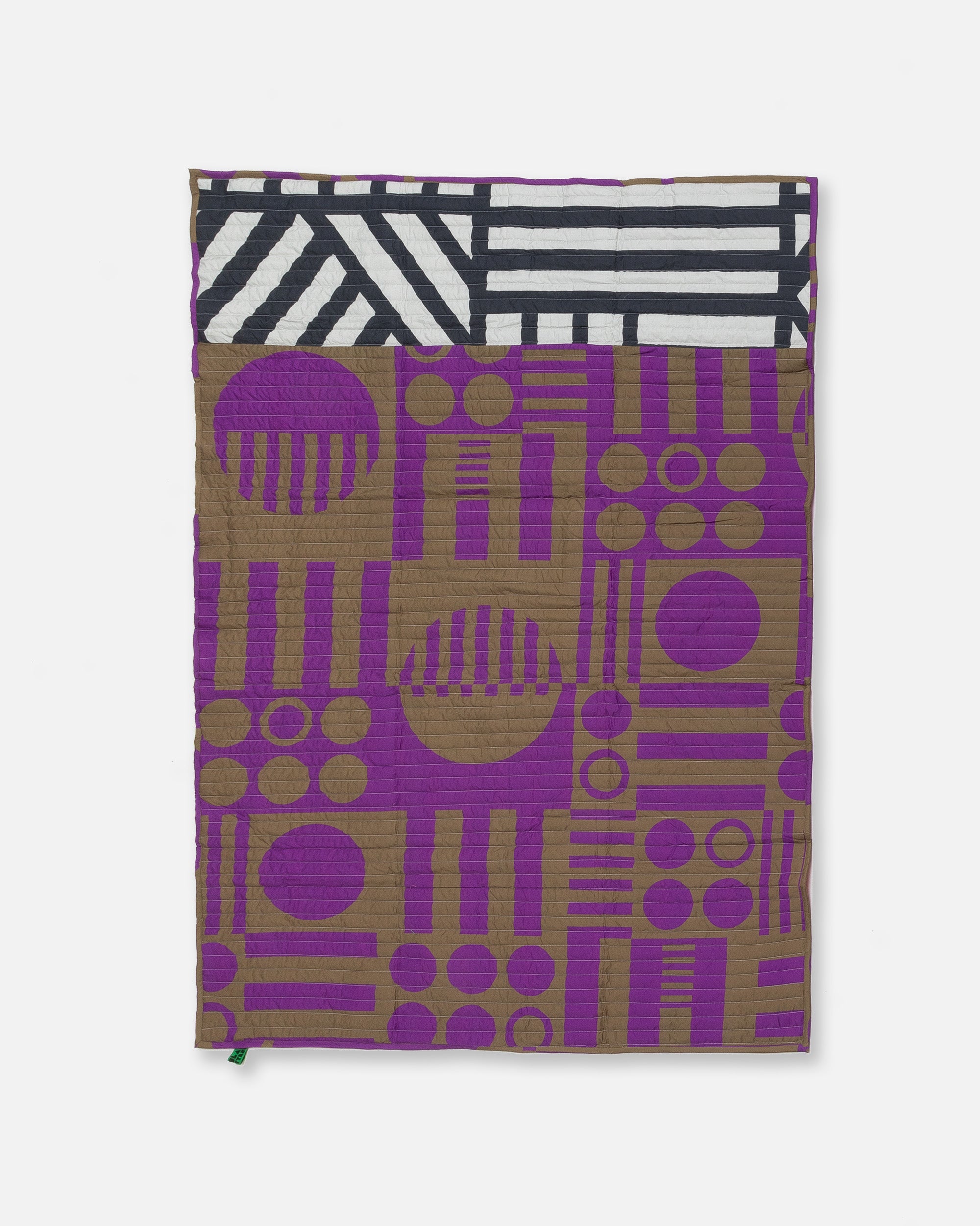 Reversible Quilted Throw in Hot Grape