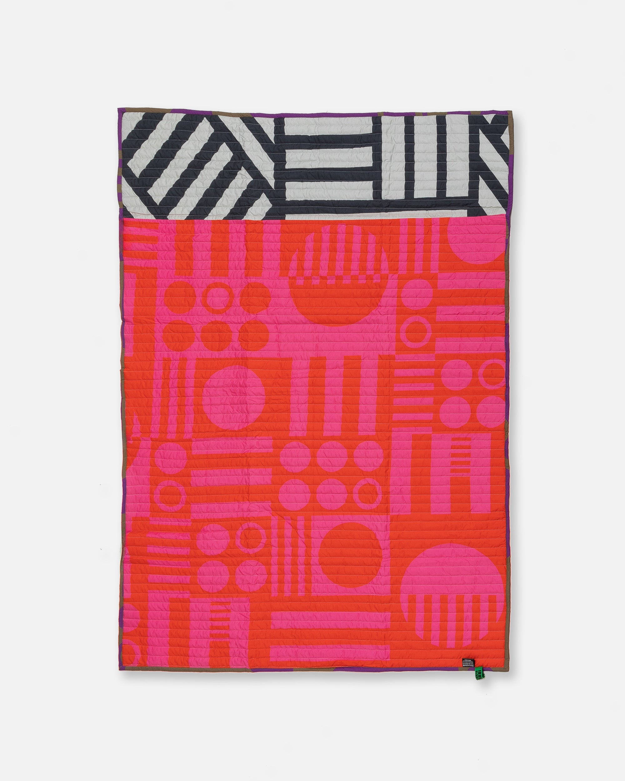 Reversible Quilted Throw in Hot Grape